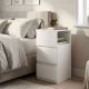 ModernHome naktinis staliukas su LED apšvietimu ir 2 stalčiais, baltas