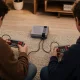 Retro TV žaidimų konsolė su 620 žaidimų ir 2 pulteliais, pilka