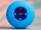 Compact wireless Bluetooth speaker IPX4 with suction cup and bass