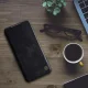 Nillkin Qin knygutės tipo dėklas Samsung Galaxy A13 5G telefonui, juodas
