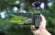 Sunnylife OP3-AD744 telefono laikiklis su priedų dėklu kamerai DJI Osmo Pocket 3