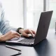 Dėklas Spigen AirSkin, skirtas MacBook Pro 16 (2021–2026), Frost Black