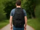 Turistinė žygių kuprinė 35 l su USB jungtimi, juoda